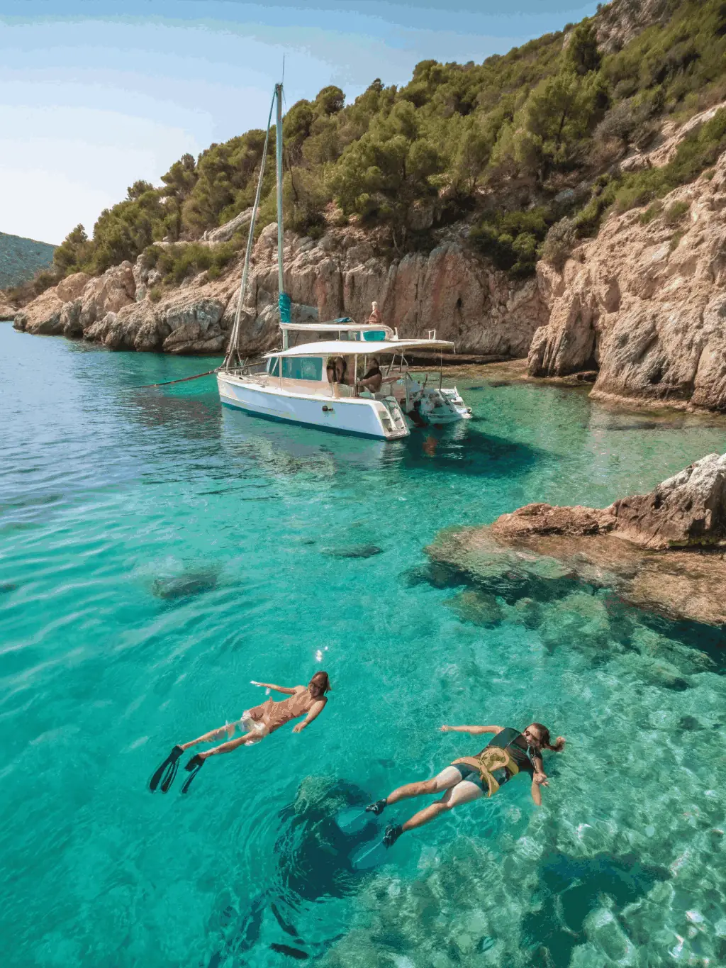 A group of snorkelers enjoying a guided tour in clear, shallow waters, showcasing the accessibility and fun of snorkeling programs for all ages.