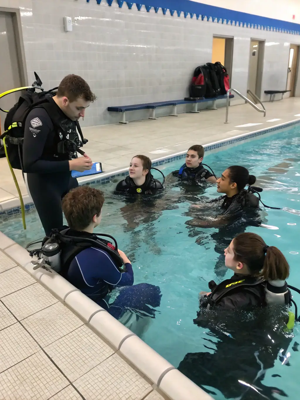 Participants in an underwater photography workshop, capturing stunning images of marine life and seascapes under the guidance of an expert instructor.